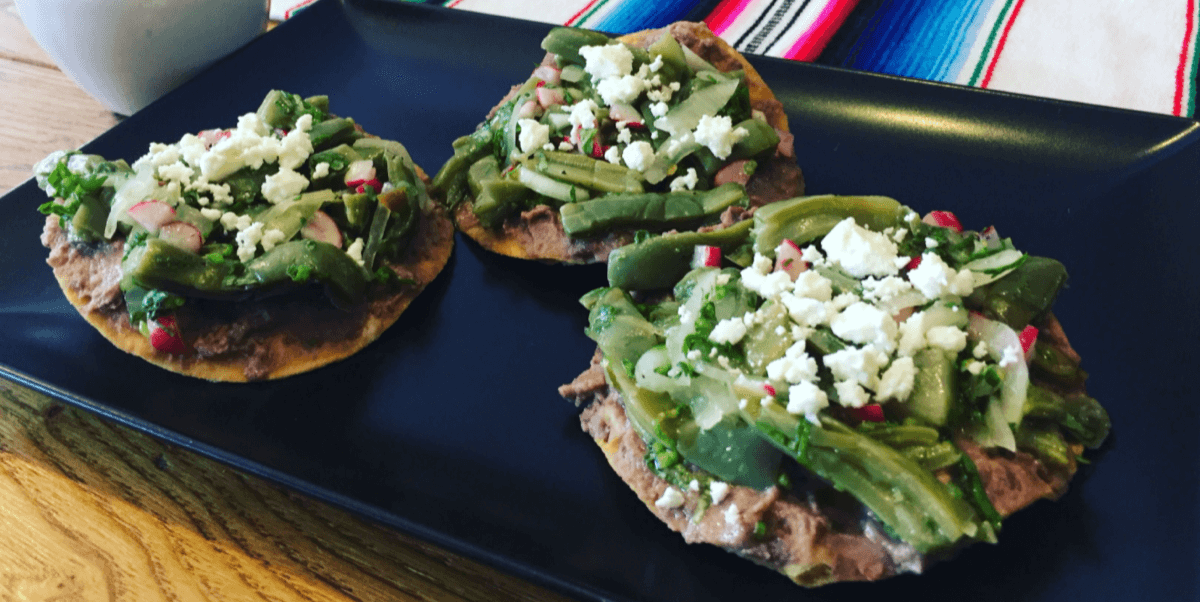 Nopales salad on a trio of Tostadas